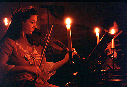 A violinist plays in a stringed quartet in Williamsburg.